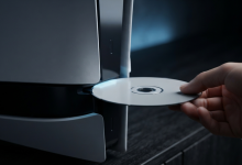 PlayStation 5 console with physical game disc being inserte