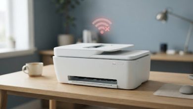 HP printer on a desk with an offline status indicator light