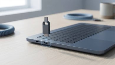 USB flash drive hovering near a laptop port with a visual gap suggesting a failed connection